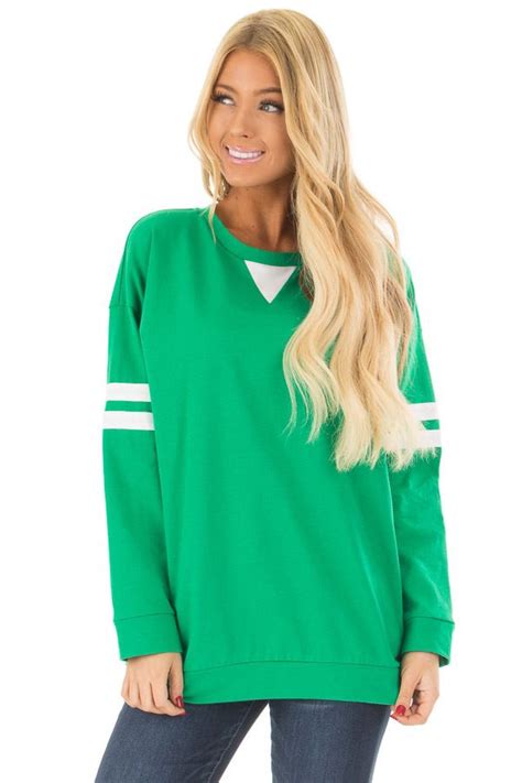 kelly green long sleeve top.